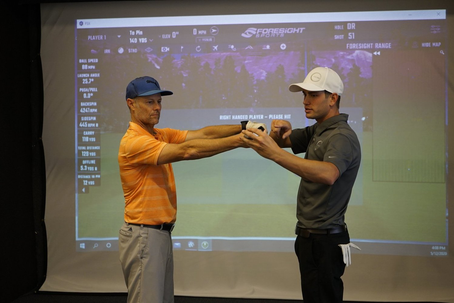Hands-on golf instruction with shot analysis at GolfCode 360 Studios
